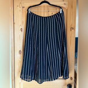 JM Collection skirt. Black and white geometric pattern size 16.